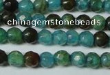 CAG4785 15.5 inches 4mm faceted round fire crackle agate beads