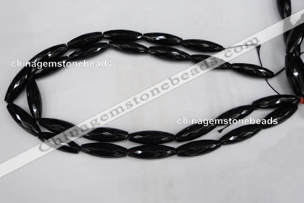 CAG5062 15.5 inches 10*30mm faceted rice black agate beads