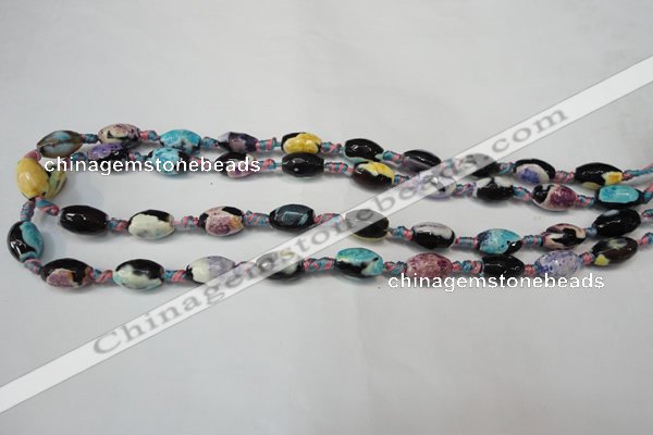 CAG5772 15 inches 8*12mm faceted rice fire crackle agate beads