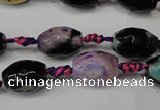 CAG5775 15 inches 10*14mm faceted rice fire crackle agate beads