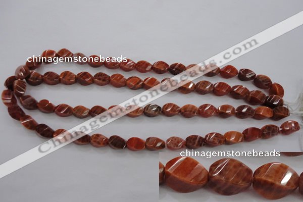 CAG581 15.5 inches 8*12mm faceted & twisted rice natural fire agate beads