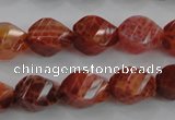 CAG582 15.5 inches 10*14mm faceted & twisted rice natural fire agate beads