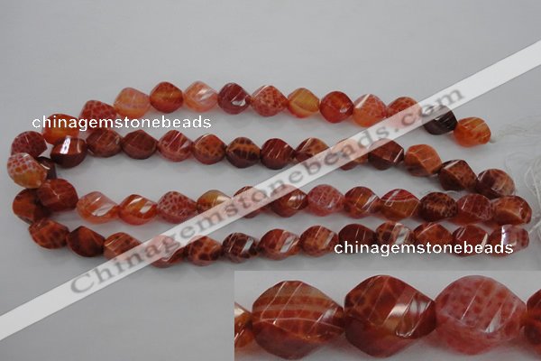 CAG582 15.5 inches 10*14mm faceted & twisted rice natural fire agate beads