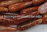 CAG596 15.5 inches 10*30mm teardrop natural fire agate beads