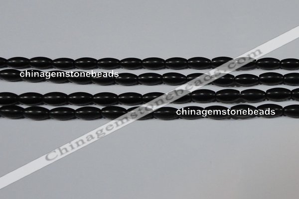 CAG6025 15.5 inches 6*12mm rice matte black agate beads