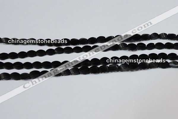 CAG6040 15.5 inches 5*8mm twisted rice matte black agate beads