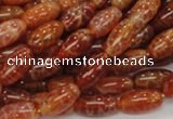 CAG605 15.5 inches 8*14mm rice natural fire agate beads wholesale