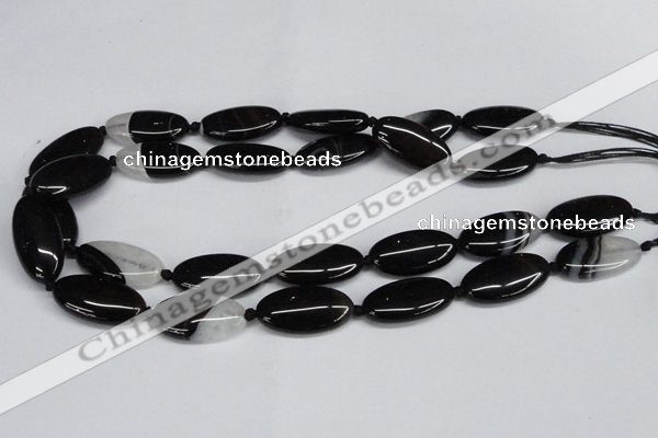 CAG6920 15.5 inches 15*30mm oval black line agate beads