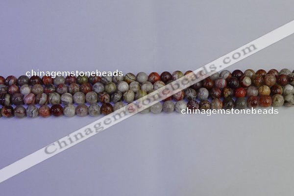 CAG9110 15.5 inches 4mm round Mexican crazy lace agate beads