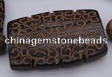 CAL20 14.5 inches 42*59mm carved flat drum agalmatolite beads