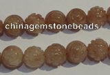 CBQ14 15.5 inches 10mm carved round strawberry quartz beads