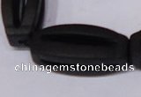 CBS28 15.5 inches 15*35mm carved flat drum black stone beads