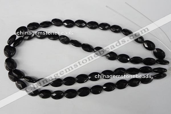 CBS310 15.5 inches 10*14mm faceted oval blackstone beads wholesale