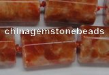 CCA471 15.5 inches 15*22mm faceted tube orange calcite gemstone beads