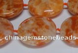 CCA477 15.5 inches 25mm flat round orange calcite gemstone beads