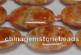 CCA484 15.5 inches 18*25mm oval orange calcite gemstone beads