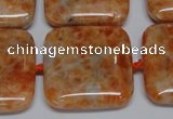 CCA494 15.5 inches 25mm square orange calcite gemstone beads