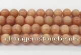 CCA517 15.5 inches 12mm round peach calcite gemstone beads