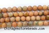 CCA554 15.5 inches 12mm round peach calcite gemstone beads