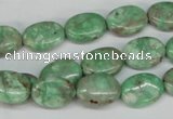 CCO117 15.5 inches 10*14mm oval dyed natural chrysotine beads