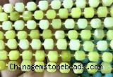 CCU1426 15 inches 6mm - 7mm faceted cube lemon jade beads