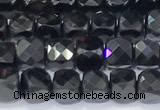 CCU855 15 inches 4mm faceted cube black spinel beads