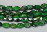 CDE178 15.5 inches 6*8mm oval dyed sea sediment jasper beads