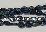 CDE233 15.5 inches 6*8mm oval dyed sea sediment jasper beads