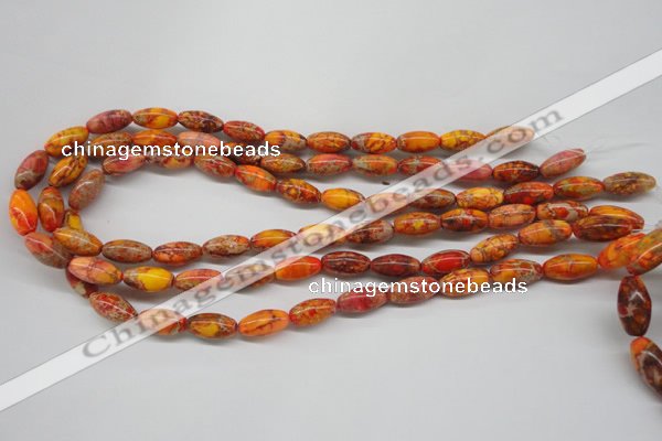 CDE510 15.5 inches 8*16mm rice dyed sea sediment jasper beads