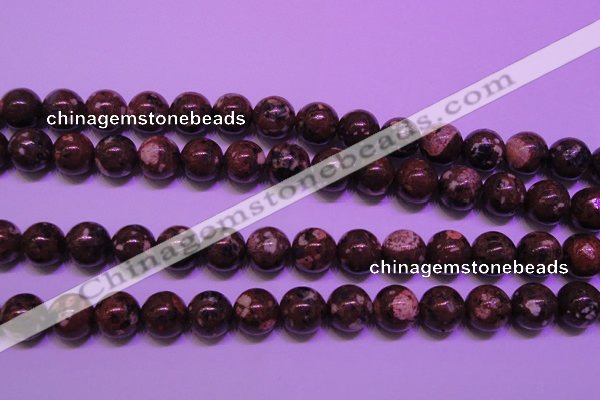 CDM53 15 inches 10mm round strawberry dalmatian jasper beads