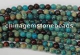 CDS25 15.5 inches 4mm round dyed serpentine jasper beads