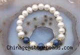 CFB1030 9mm - 10mm potato white freshwater pearl & dumortierite stretchy bracelet