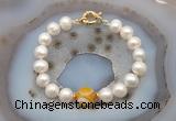 CFB1037 Hand-knotted 9mm - 10mm potato white freshwater pearl & yellow banded agate bracelet