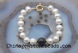 CFB1056 Hand-knotted 9mm - 10mm potato white freshwater pearl & golden obsidian bracelet