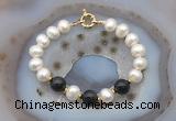 CFB1057 Hand-knotted 9mm - 10mm potato white freshwater pearl & black obsidian bracelet