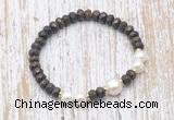 CFB756 faceted rondelle bronzite & potato white freshwater pearl stretchy bracelet