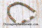 CFB759 faceted rondelle unakite & potato white freshwater pearl stretchy bracelet