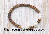 CFB768 faceted rondelle yellow tiger eye & potato white freshwater pearl stretchy bracelet