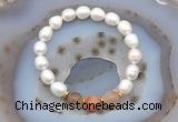 CFB913 9mm - 10mm rice white freshwater pearl & rainbow moonstone stretchy bracelet