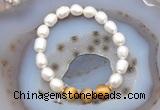 CFB914 9mm - 10mm rice white freshwater pearl & golden tiger eye stretchy bracelet