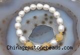 CFB928 9mm - 10mm rice white freshwater pearl & honey jade stretchy bracelet