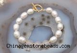 CFB934 Hand-knotted 9mm - 10mm rice white freshwater pearl & rose quartz bracelet