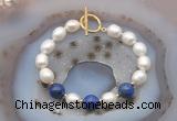 CFB941 Hand-knotted 9mm - 10mm rice white freshwater pearl & lapis lazuli bracelet