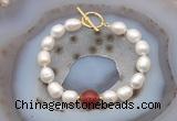 CFB974 Hand-knotted 9mm - 10mm rice white freshwater pearl & red agate bracelet