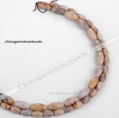 CFC54 15.5 inches rice shape coral fossil jasper beads wholesale