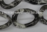 CFG268 15.5 inches 25*30mm carved oval black & white jasper beads