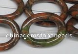 CFG271 15.5 inches 24*30mm carved oval unakite gemstone beads