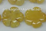 CFG458 15.5 inches 24mm carved flower yellow jade beads