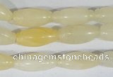 CFG552 15.5 inches 8*20mm carved rice yellow aventurine beads