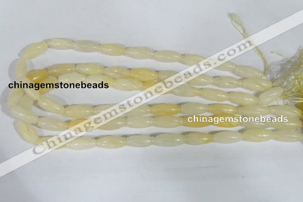 CFG552 15.5 inches 8*20mm carved rice yellow aventurine beads